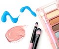 Cosmetics: nail polish, foundation, eye shadow box isolated objects. Royalty Free Stock Photo
