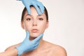 Cosmetologist apply mentoplasty. Beauty girl skin do Facelift at cosmetology spa. Women model treatment Royalty Free Stock Photo