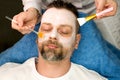 Facial cosmetic mask for man Royalty Free Stock Photo