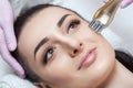 The cosmetologist does rf-lifting. Rf lifting procedure