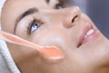 The cosmetologist makes the procedure electrotherapy of the facial ski