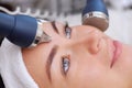 The cosmetologist makes the procedure an ultrasonic cleaning of the facial skin