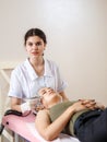 cosmetology beauty clinic.Professional cosmetologist conducts cell oxygenation for the face Ozone treatment with