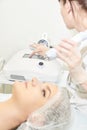 Cosmetology light equipment. Anti age and wrinkle. Microcurrent medicine treatment. Beauty woman. Sincare clinic. aesthetic peelin Royalty Free Stock Photo