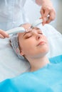Cosmetology procedure Microcurrents. Beauty Doctor cosmetologist doing aesthetics facial therapy microcurrents