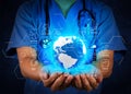 Medical Doctor holding a world globe in his hands as medical net Royalty Free Stock Photo