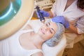 Cosmetology Spa woman doing procedures on the face Royalty Free Stock Photo