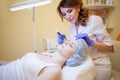 Cosmetology Spa woman doing procedures on the face Royalty Free Stock Photo