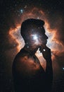 Cosmic Mind A Silhouette of Thought Against the Nebula Royalty Free Stock Photo