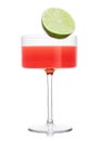 Cosmopolitan cocktail in modern crystal glass with lime half on white Royalty Free Stock Photo