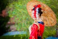 Cosplay. beautiful, modest geisha in a red kimono Royalty Free Stock Photo