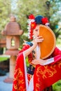 Cosplay. beautiful, modest geisha in a red kimono Royalty Free Stock Photo