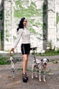 Cosplay on Cruella de Vil with a Dalmatian