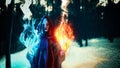 Cosplay, fantastic, artistic photo processing. A girl in a black robe, from her hands comes a fire of    turquoise and dark yellow Royalty Free Stock Photo