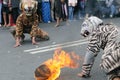 Cosplay lion dance with fire attraction at the carnaval of Indonesia's independence celebration in Batu City on august 2019