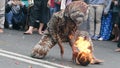 Cosplay lion dance with fire attraction at the carnaval of Indonesia's independence celebration in Batu City on august 2019