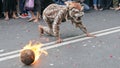 Cosplay lion with fire dance attraction at the carnaval of Indonesia's independence celebration in Batu City on august 2019