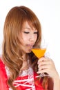 Cosplay of Maid drink Orange juice glass on white backgound. Royalty Free Stock Photo