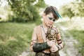 cosplay of Ukrainian Kozak. Cute Caucasian boy holding mace with emblem of Ukraine pretending to be fearless warrior Royalty Free Stock Photo