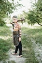 cosplay of Ukrainian Kozak. Cute Caucasian boy holding mace with emblem of Ukraine pretending to be fearless warrior Royalty Free Stock Photo