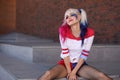 Cosplayer girl with in Harley Quinn costume