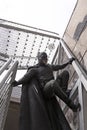 Cosplayer climbs with Batman costume