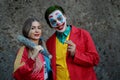 Cosplayer couple dressed as Joker and Harley Quinn, character from the DC Comics series at the Lucca Comics and Games 2022.