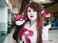 Cosplayer dressed as Jessie from Pokemon