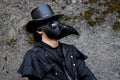 Cosplayer dressed as medieval steampunk plague doctor at Lucca Comics and Games 2023 cosplay event.