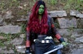 Cosplayer girl dressed as Gamora, member of the Guardians of the Galaxy and character from the Marvel Comics series.