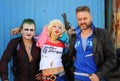 Cosplayer girl in Harley Quinn costume and cosplayer men in Joker and Boomerang Royalty Free Stock Photo