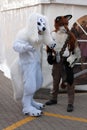Cosplayers dressed as characters wolves pose at Animefest