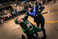 Cosplayers dressed as 'Nightwing' and 'Mad Hatter' from 'Batman'