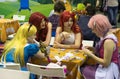 Cosplayers playing table game at the Gamefilmexpo festival