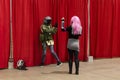 Cosplayers posing at the Comic Expo