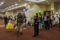 Cosplayers posing and performing at the Comic Expo