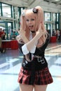 Cosplayers wearing costumes and fashion accessories at Anime Exp