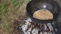 Cossack kulish. onions, meat and lard are cooked in a cast-iron cauldron on fire. The main field porridge of Ukraine