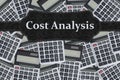 Cost Analysis concept with calculators and financial data Royalty Free Stock Photo