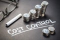 Cost Control and Coins Royalty Free Stock Photo