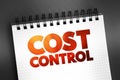 Cost Control - practice of identifying and reducing business expenses to increase profits, text concept on notepad Royalty Free Stock Photo