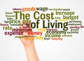 The cost of living word cloud and hand with marker concept Royalty Free Stock Photo