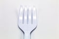 Cost-up plastic spoon and fork isolated on white background. Royalty Free Stock Photo