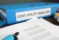 Cost utility analysis CUA documents. Royalty Free Stock Photo