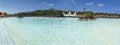 Costa Adeje, Tenerife, Spain Ã¢â¬â July 16, 2019: People swimming and enjoying artificial wave in Siam waterpark.