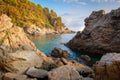 Costa Brava sea coast. Spain seaside. Rocky bay in Lloret de Mar. Santa Cristina playa in spanish resort. Picturesque rocky beach