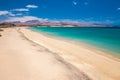 Costa Calma sandy beach with vulcanic mountains on Jandia peninsula, Fuerteventura island, Canary Islands, Spain.