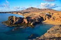 Costa de Papagayo on a sunny evening. The mountain range Los Ajaches in the background. Lanzarote, Spain