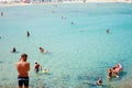 Costa Rei, Italy - August 25: Unidentified people in beach called Scoglio di Peppino. Sunny day in summertime, crystal water like Royalty Free Stock Photo