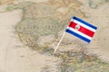 Costa Rica flag pin on world map Royalty Free Stock Photo